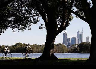 Commute home by bicycle along the Swan River.